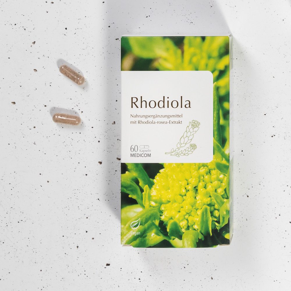 Rhodiola rosea Packung mit zwei Steckkapseln auf hellem Untergrund